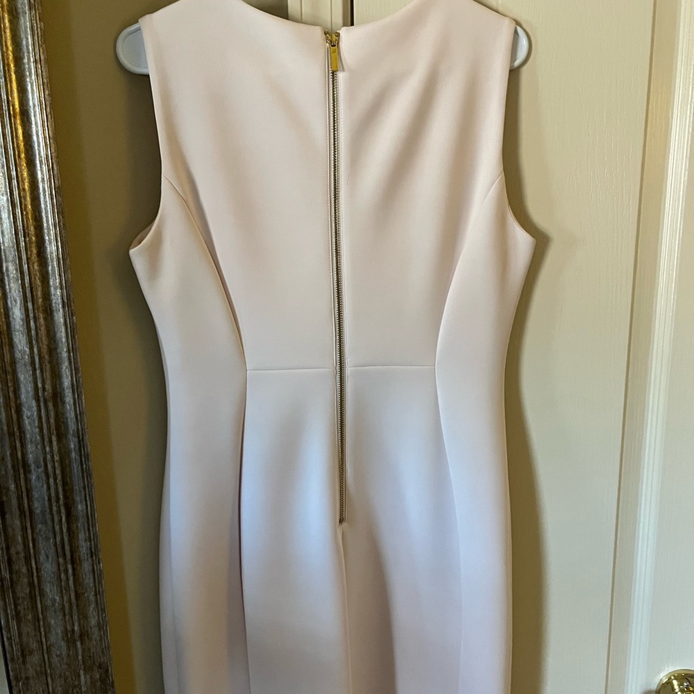 Calvin Klein dress. Light pink. Worn once for a wedding. Excellent condition.